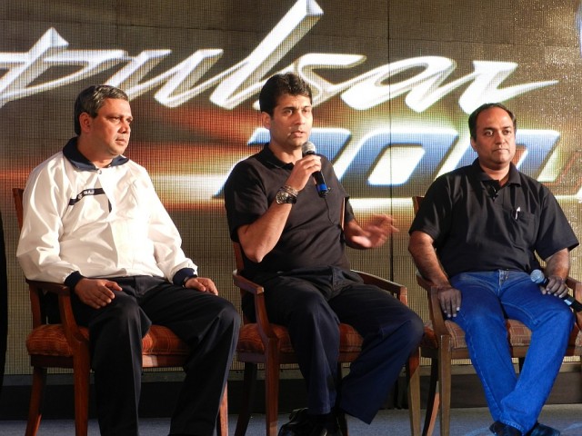 (R to L ) Mr. Joseph Abraham, CTO, Mr. Rajiv Bajaj, MD, and Mr. K.Srinivas, President-Motorcycles, take questions from the media