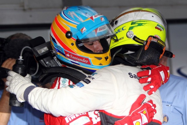 Sergio Pérez is congratulated by Fernando Alonso at the F1 2012 Malaysian GP