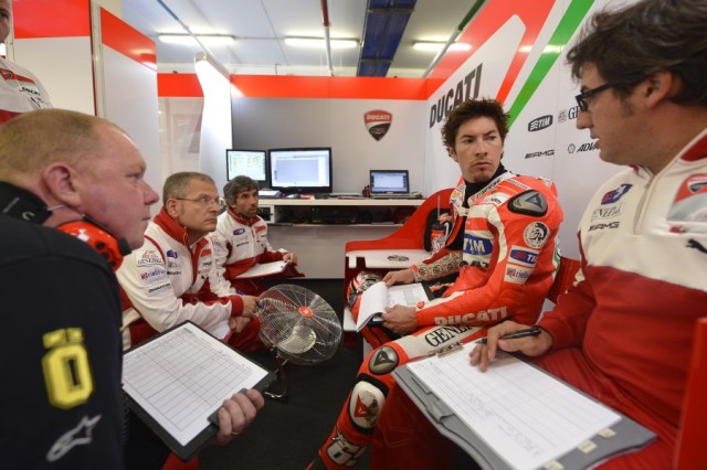 Nicky Hayden with Juan Martinez, Crew Chief, Ducati Team : 2012 MotoGP Grand Prix Of Portugal Qualifying 03