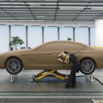 BMW 6 Series Gran Coupe : From left, Syrus Haghayegh, Ulrike Müller and Andreas Schinner from Form Finding working on the clay model