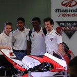 Riccardo Moretti, Sarath Kumar, and at the right extreme, Danny Webb pose with a fan