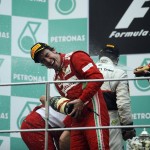 Alonso pops the champagne at F1 2012 Malaysian Grand Prix