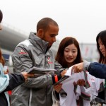 Hamilton signs autographs for fans at Shangai International Circuit Vodafone McLaren Mercedes 2012 Formula 1 Chinese Grand Prix 02