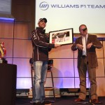 Mark Gillan with Pastor Maldonado as he pays a visit to the factory to meet the team after winning the Spanish Grand Prix at Barcelona