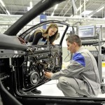 Volkswagen Golf GTI Black Dynamic : Lisa Batke (Ieft) and Martin Schmid (right) fitting the sound system cabling.