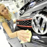Volkswagen Golf GTI Black Dynamic Laura Krätz making sure the shine is perfect.