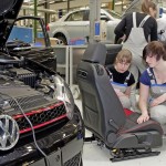 Volkswagen Golf GTI Black Dynamic : Interior Fitters (from left) Charleen Pohle and Sarah Unverzagt examining the GTI top sport seat.