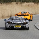 McLaren MP4-12C Spider and the McLaren P1 prototype at the unveiling of McLaren's 2013 F1 contender Vodafone McLaren Mercedes MP4-28